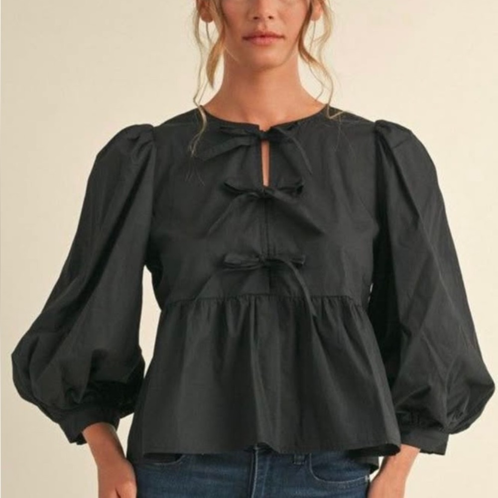 JODIFL Black Peplum Tie-Front Blouse